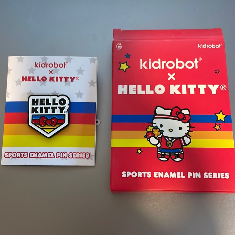 NWB Hello Kitty Kidrobot sports pin